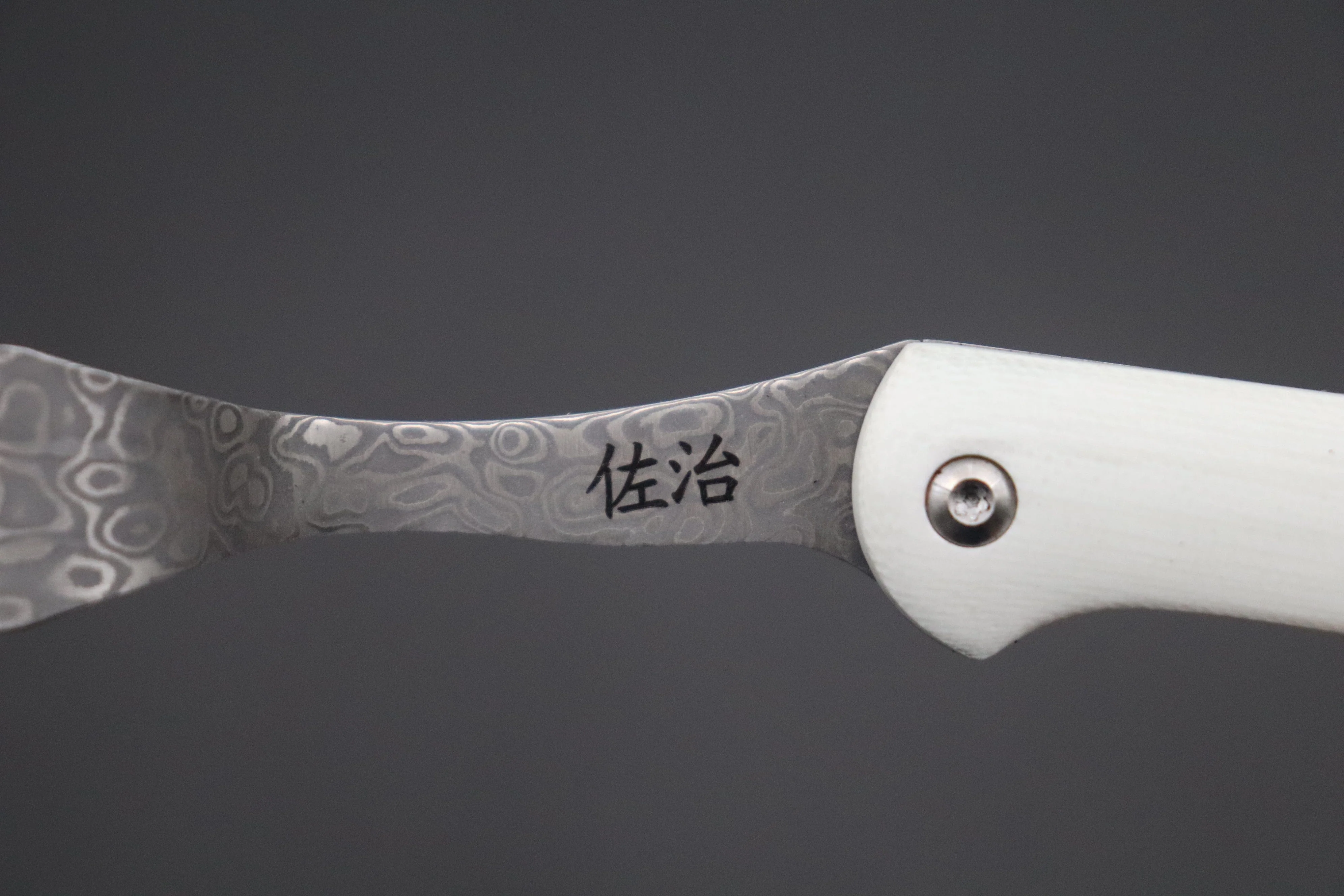 Takeshi Saji R-2 Damascus Folding Fork (White G-10 Handle, TS-130W) - Image 6